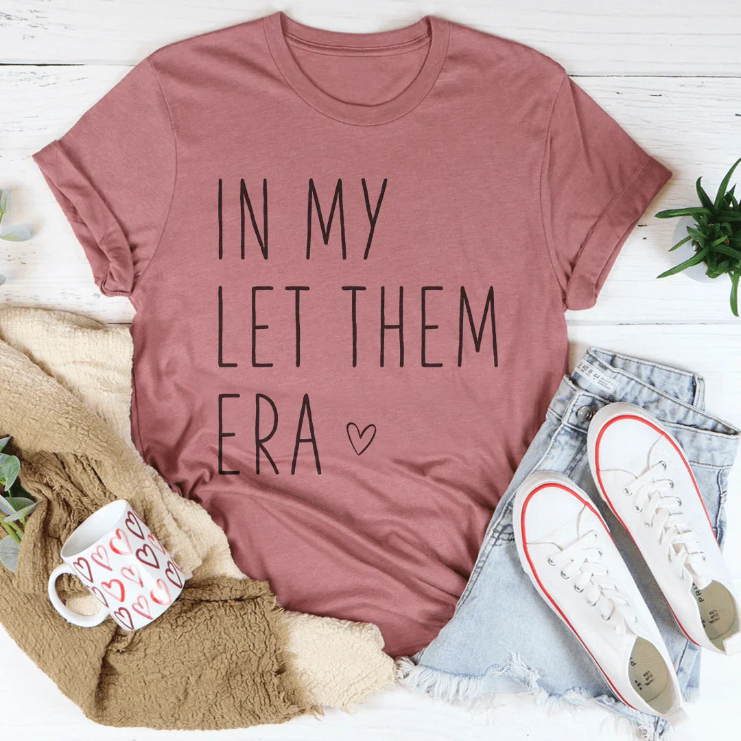 In My Let Them Era Tee