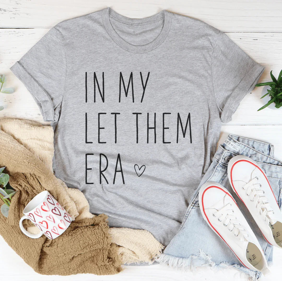 In My Let Them Era Tee